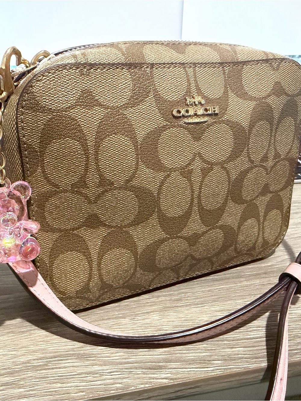 Coach Brown Signature Crossbody with Pink Strap Accent - Picture 1 of 2